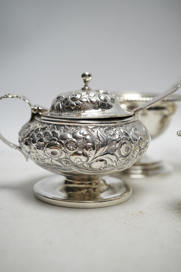 A pair of George III silver salts, London 1799, 240g, a George IV silver mustard pot, London 1822, 116g, a Victorian silver drum mustard pot, by Edward John and William Barnard, London 1850, four various mustard ladles (